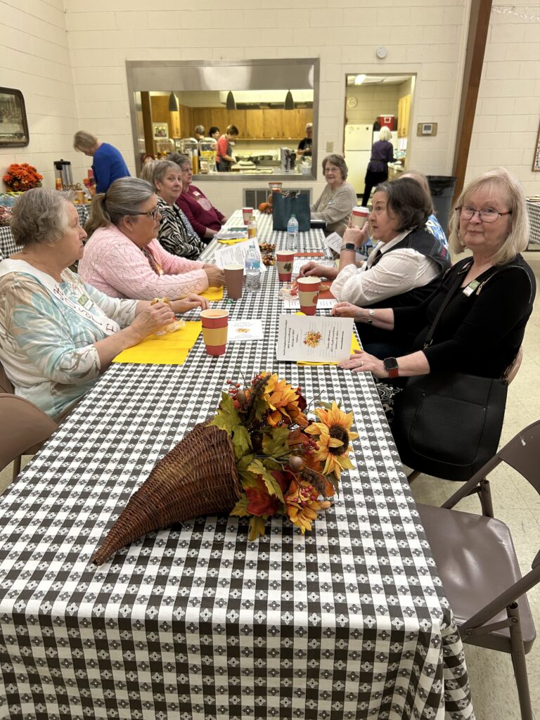 Ladies enjoying coffee and muffins